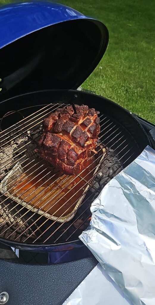 First pork shoulder with snake method on my kettle!