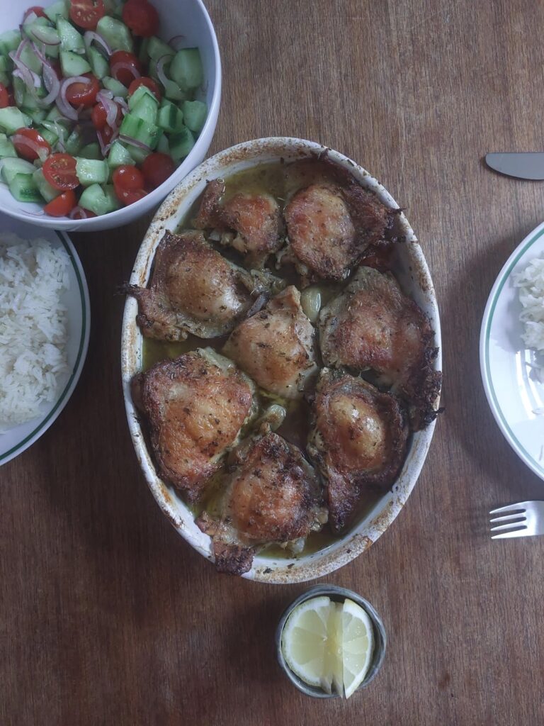 Roasted lemon chicken with buttered rice.