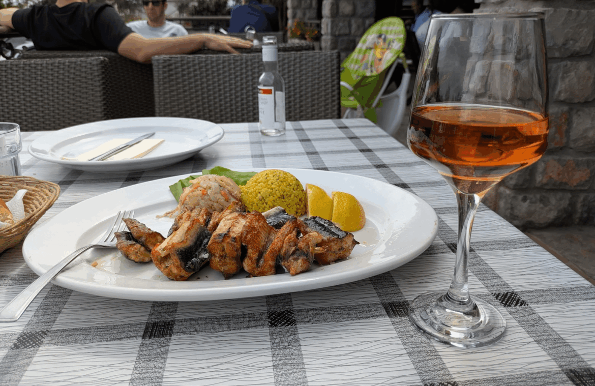 Fried eel and Montenegrian wine, in a restaurant near Podgorica airport