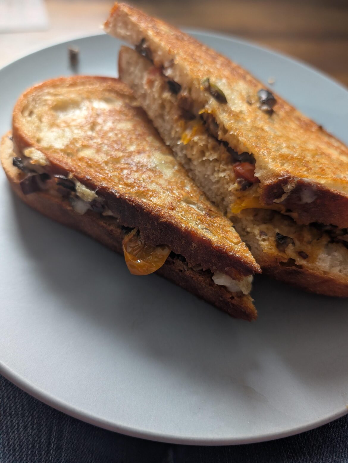 Olive, tomato, mushroom and swiss Olive, tomato, mushroom and swiss