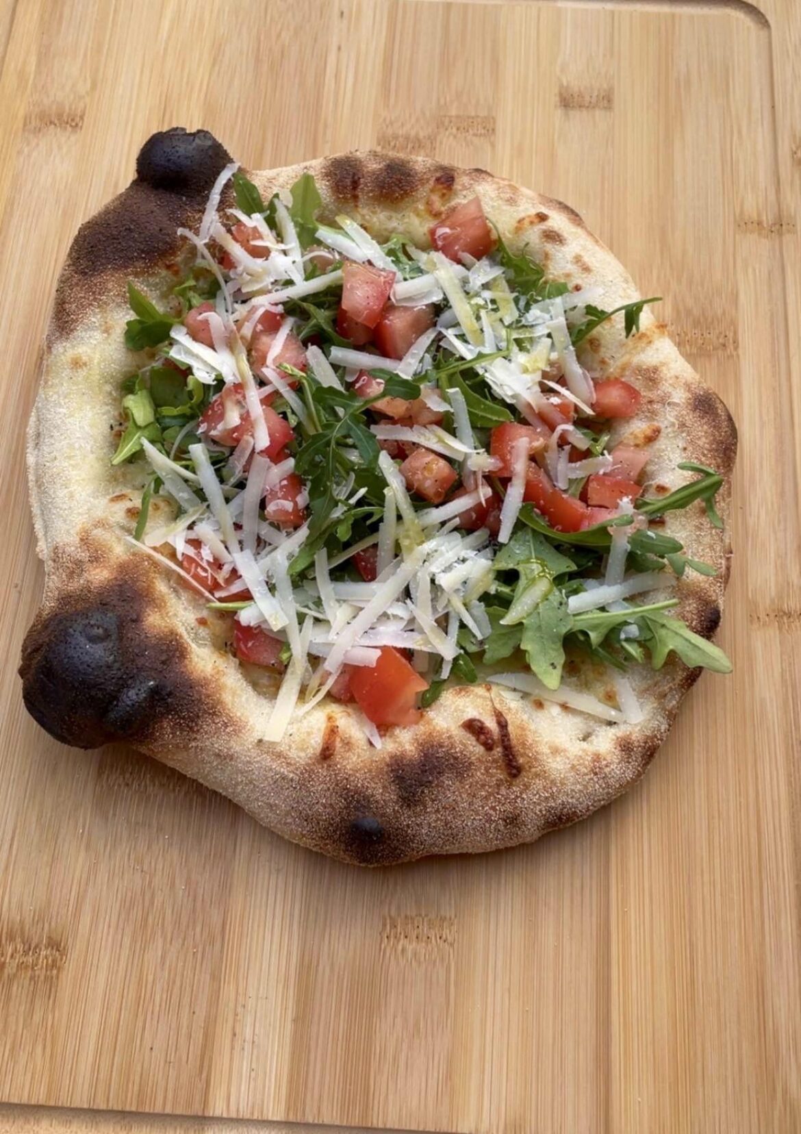 Home Oven: Aragula, Tomatoes, Mozarella, Parmiggiano Home Oven: Aragula, Tomatoes, Mozarella, Parmiggiano