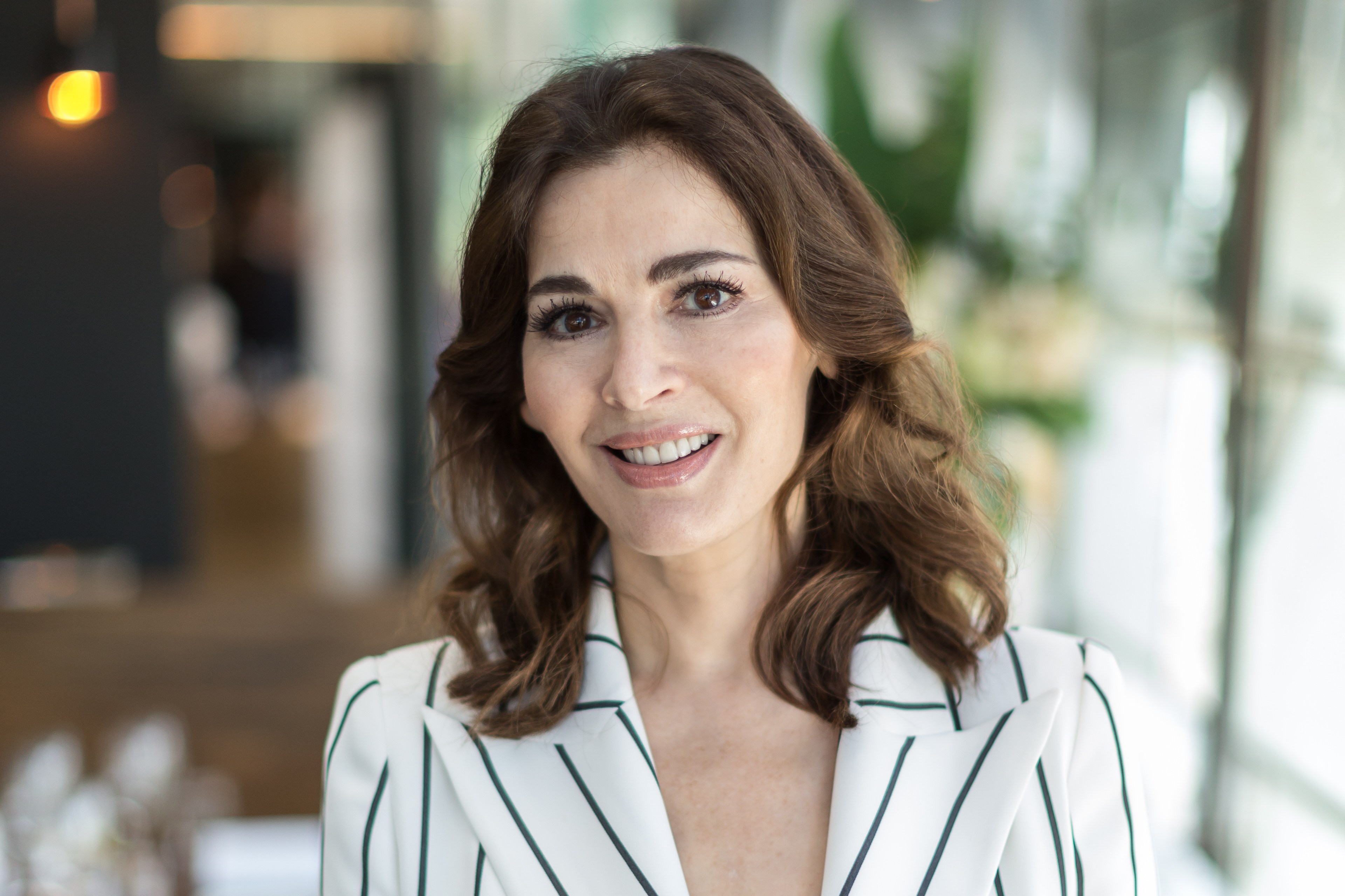 Portrait of Nigella Lawson at a book signing.