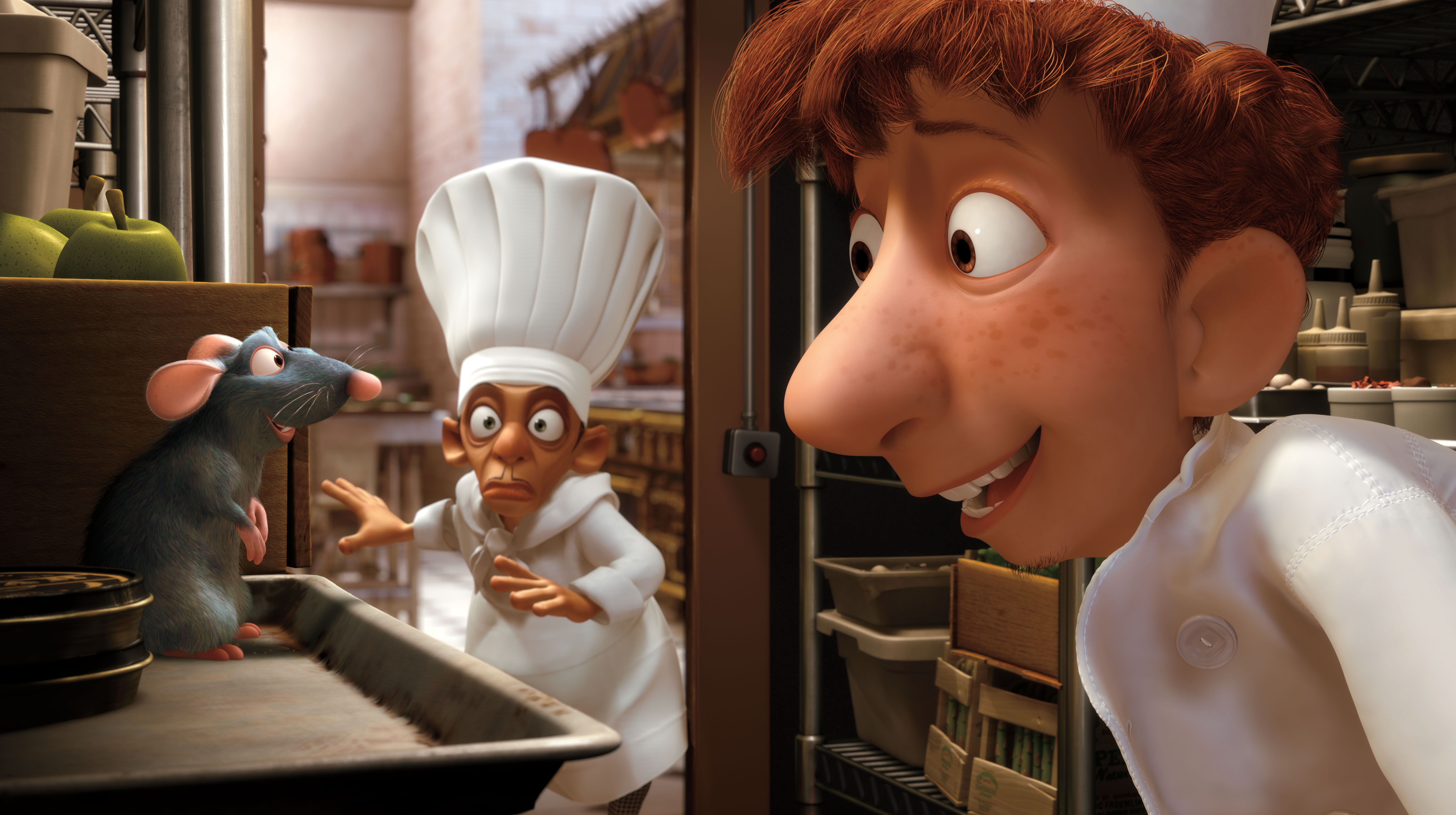 Still from Ratatouille showing Remy the rat, Linguini, and a chef.