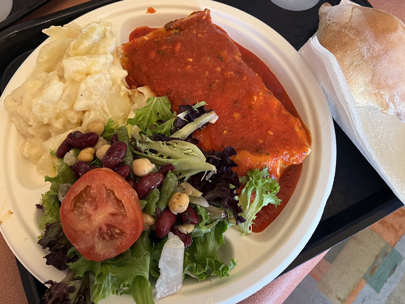 Beef lasagna with a green salad and scalloped potatoes.