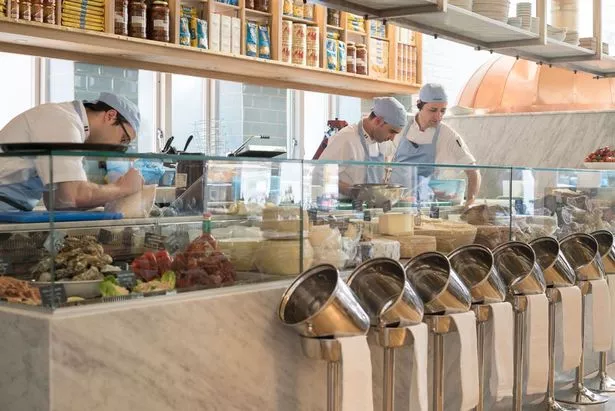 An open kitchen will allow diners to see their food made in front of them