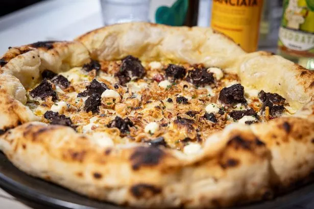 Hailed as one of the 'world's most powerful' pizzas, Forbici's biga dough is handmade fresh daily and crafted from premium flour sourced from Molini Pizzuti