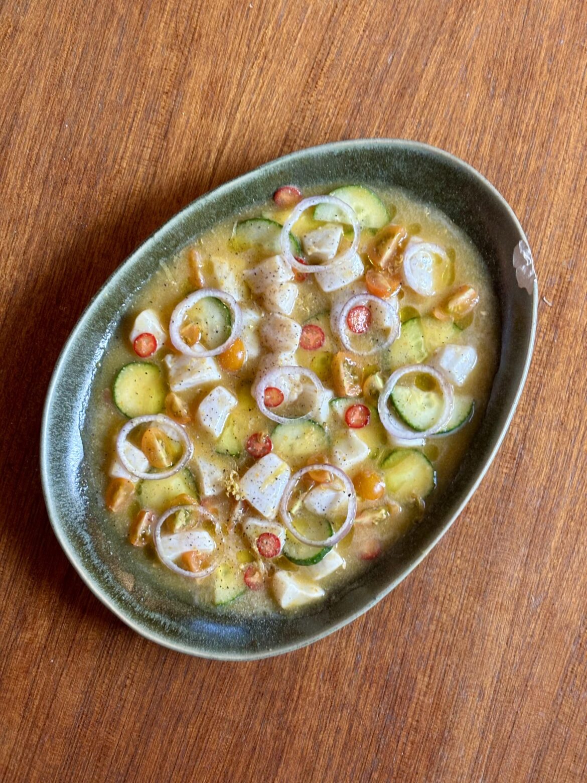 Italian-ish Aguachile; scallops in sun golds, Meyer lemon, and habanero with cucumbers and peppers.