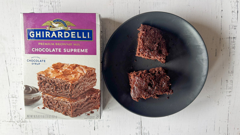 Ghirardelli brownie mix on a white surface