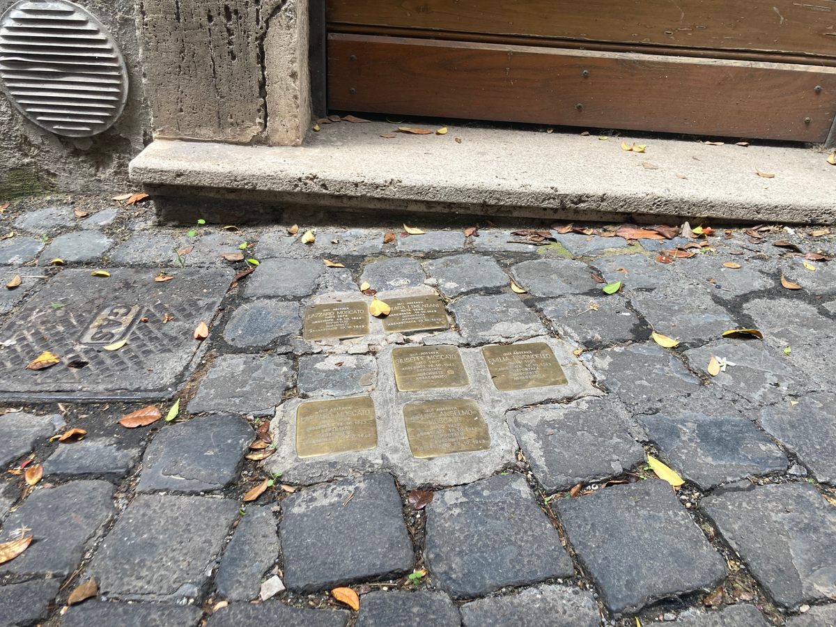 Remembrance stones in the Jewish Quarter memorialize some of the Jews who were kidnapped and sent to Auschwitz on October 16, 1943.