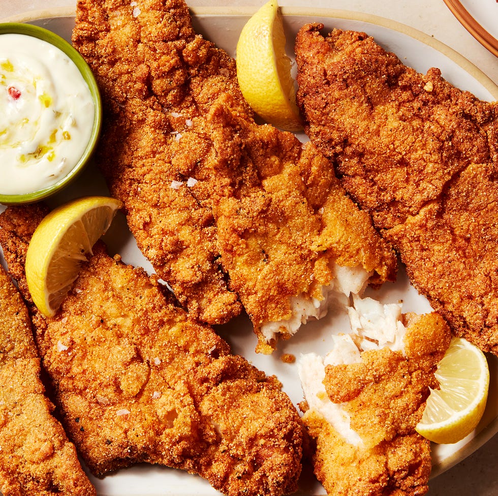 catfish battered and fried served with lemon wedges