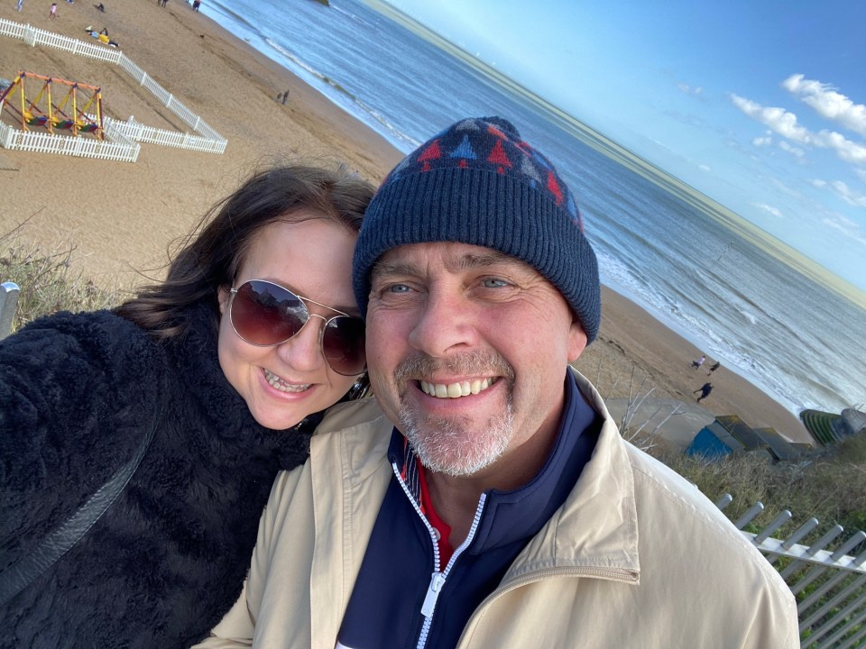Selfie of a couple at the beach.