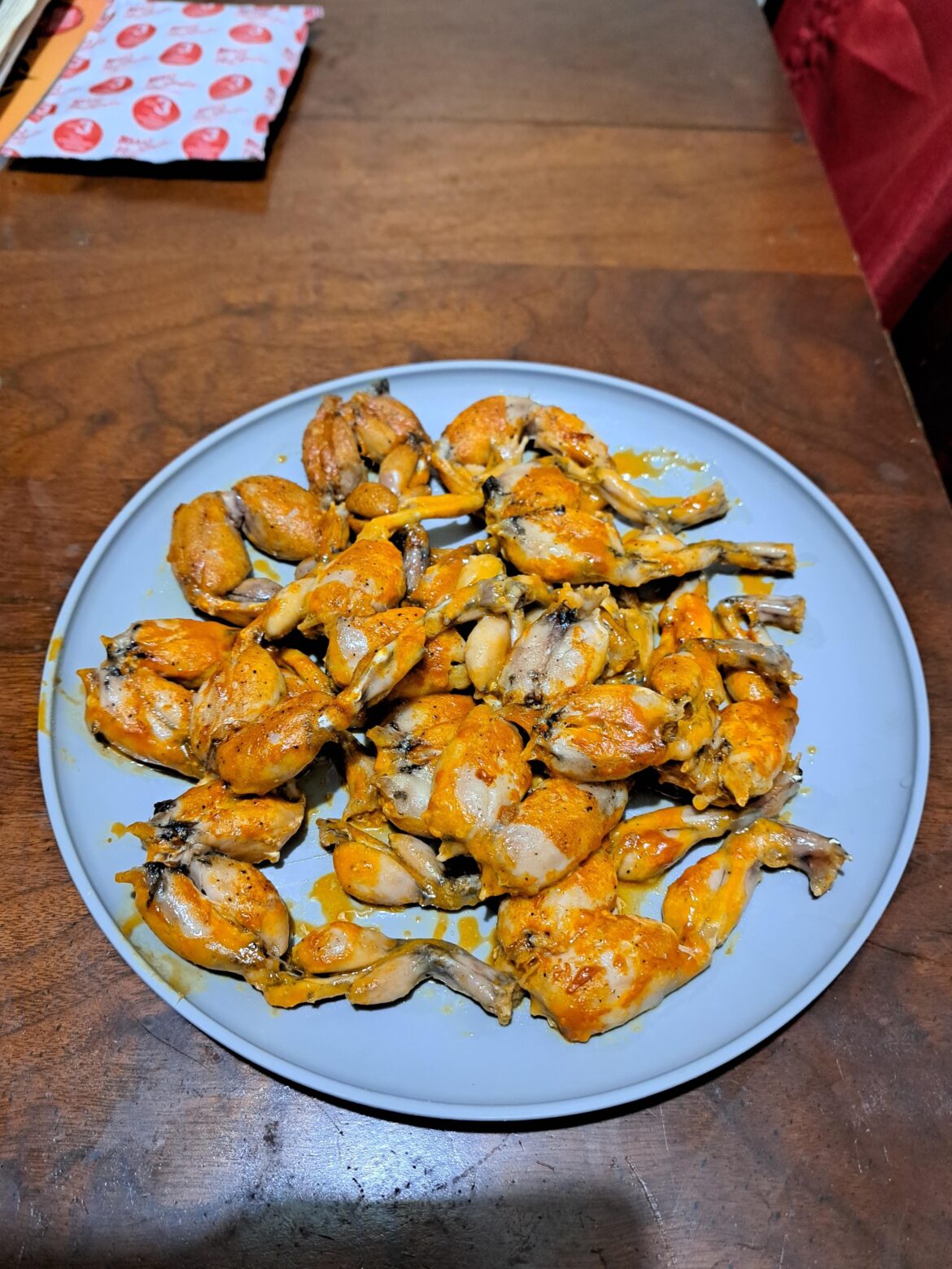 Spicy Buffalo style frog legs.