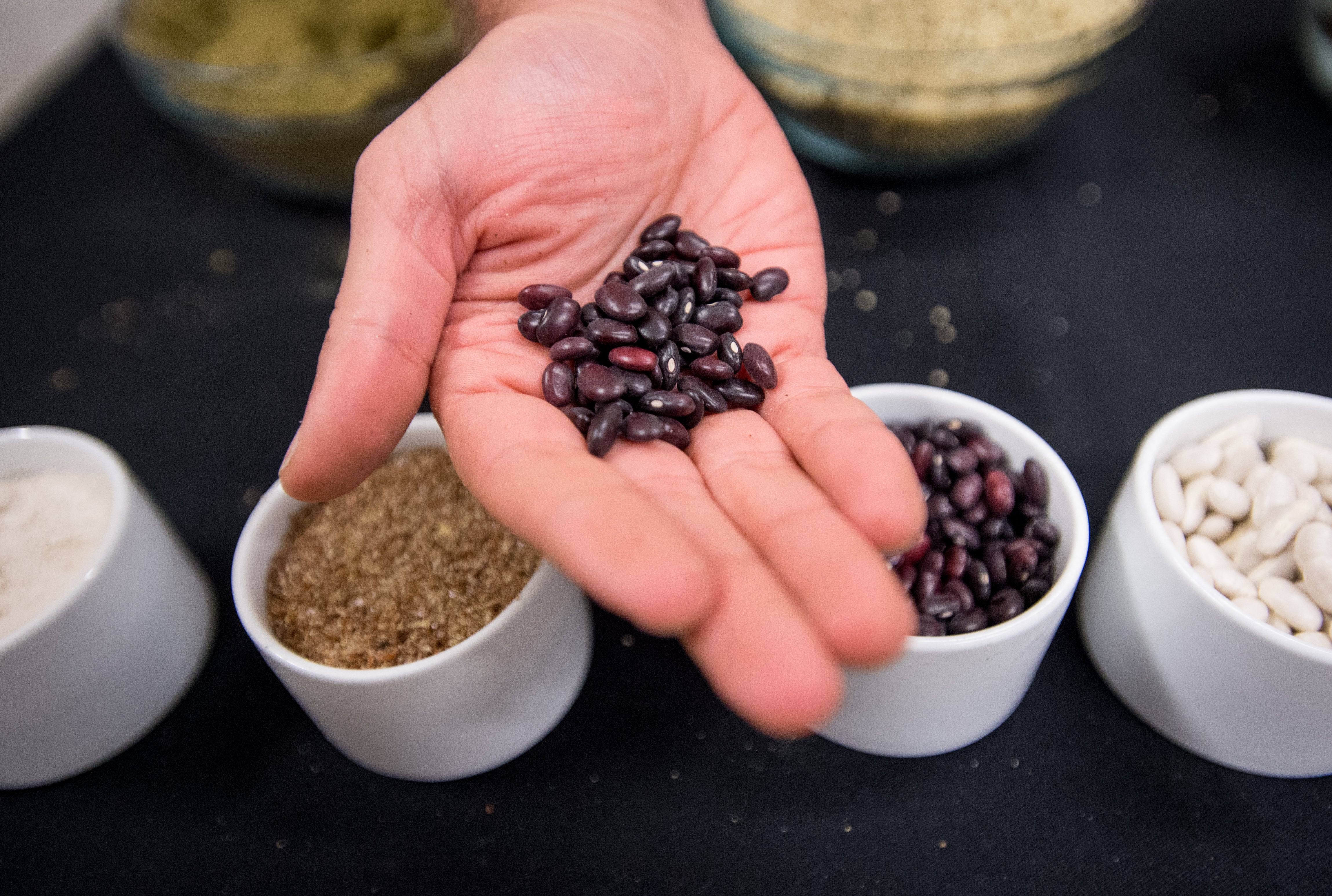 Beans from northern Thailand are displayed with other ingredients used to make vegan foods