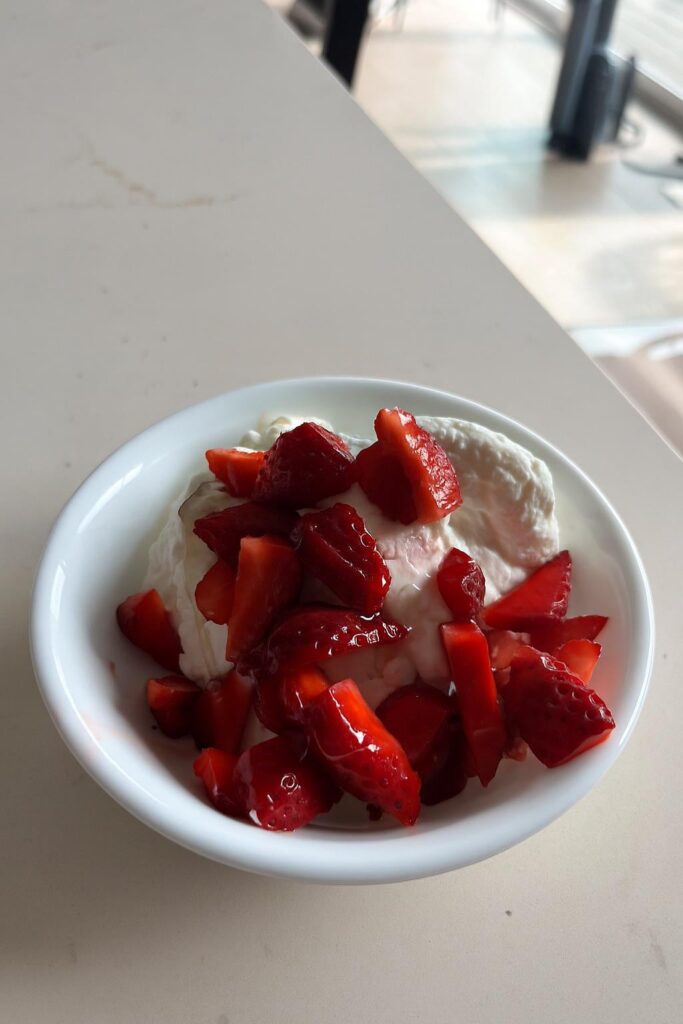 Farmstand strawberries with Greek yogurt and a honey drizzle