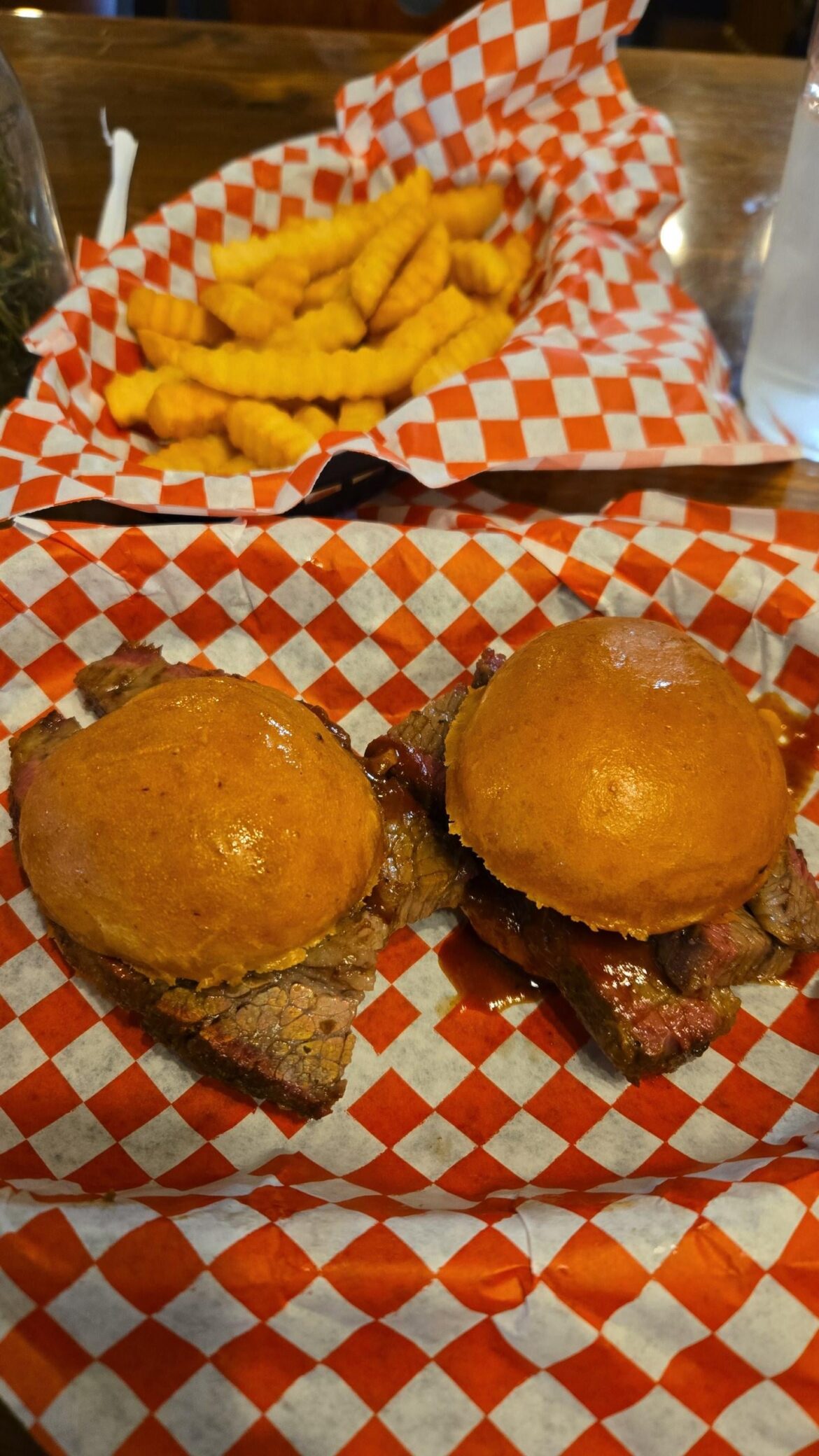 $12 for 2 brisket sliders and $3 for a basket of fries. It was delicious
