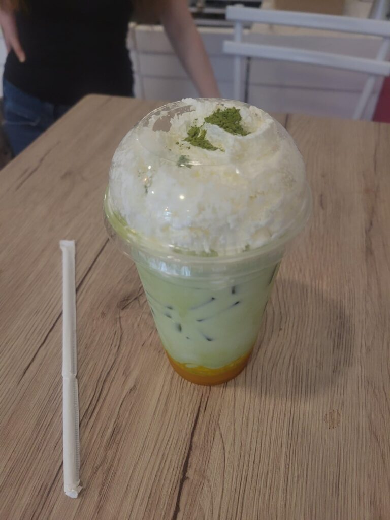 Matcha latte w/ mango and whip