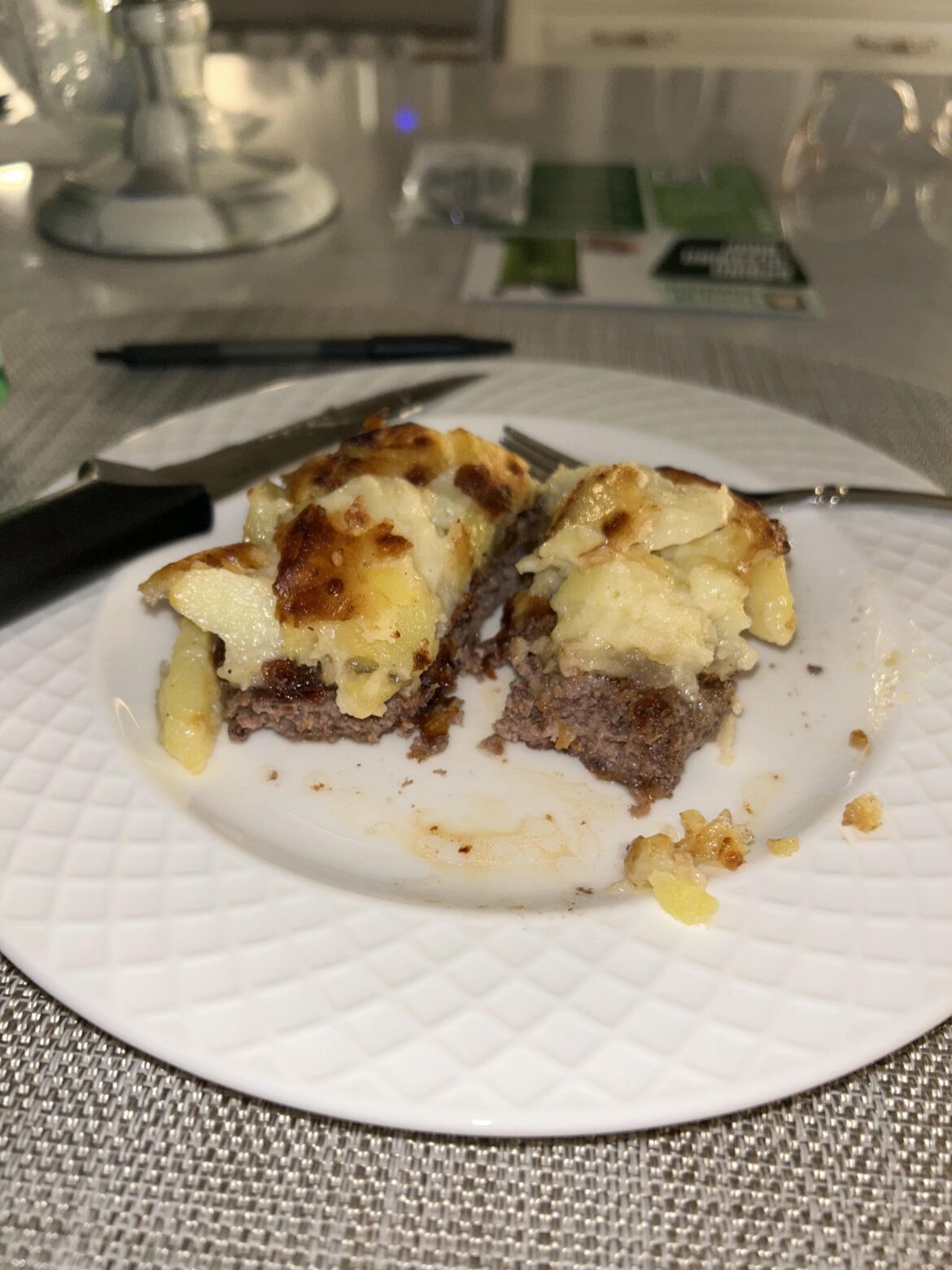 Just some potato au gratin on top of a beef patty that i overcooked. Still yummy.