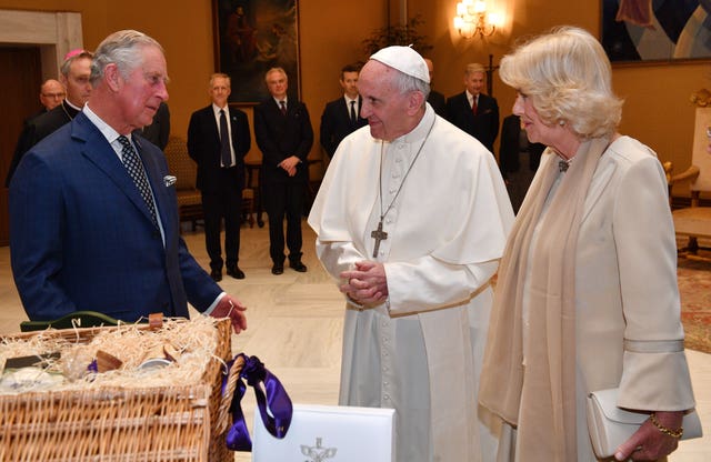 The then-Prince of Wales and Duchess of Cornwall during an audience with Pope Francis at the Vatican in 2017