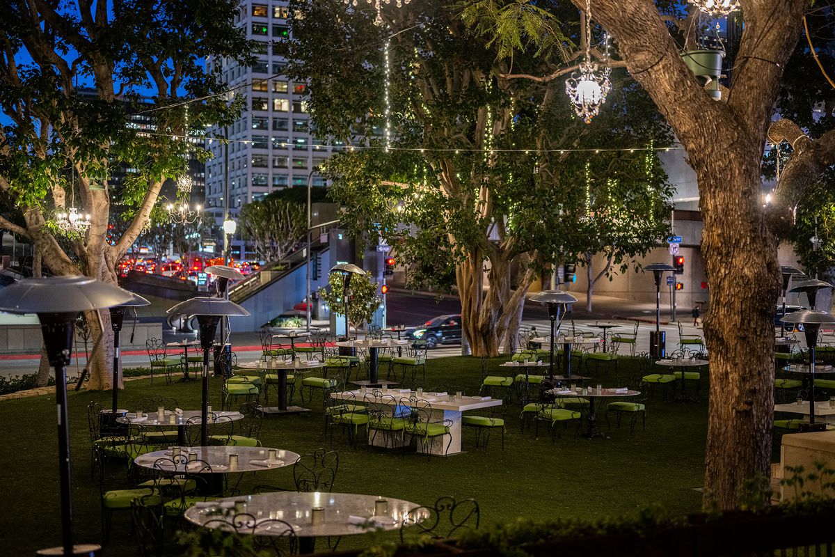 Maquire gardens at night in Los Angeles in front of Settecento.
