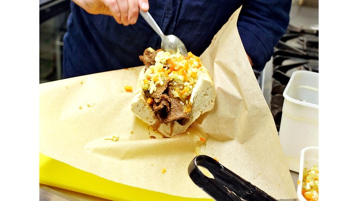 26_Max 10_sandwich Max Halley topping 'The Bear' sandwich with pickled veg