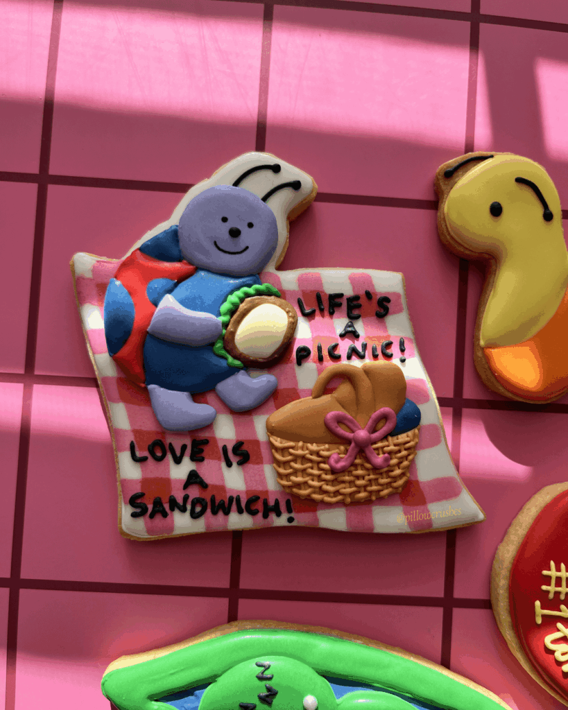 selling these cookies at a market today and i'm so happy with them 😭🩷🌀