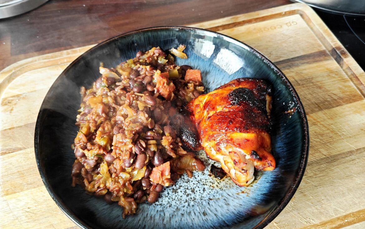 Chicken thigh in spicy bulgogi sauce, red rice and black beans with chorizo and vegetables cooked in chicken stock.