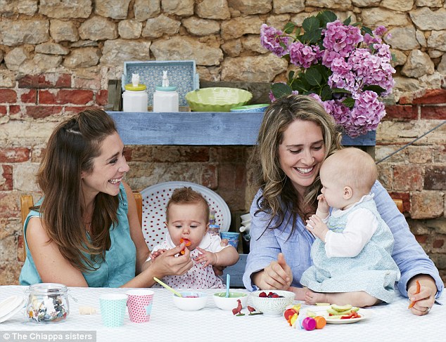 The stress-free Italian weaning philosophy is now enshrined in a new book called Baby At The Table by Michela and Emanuela Chiappa, pictured left and right respectively with two of their children, Serafina, left, and Fiorenza, right