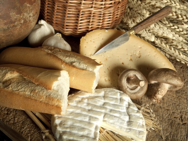 Picnic in France - cheeses, baguettes and mushrooms