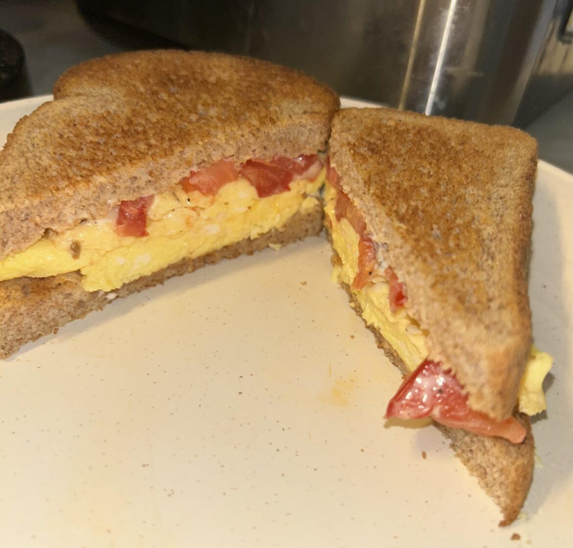 Egg sammich, with mayo, muenster cheese, and roma tomato (favorite)