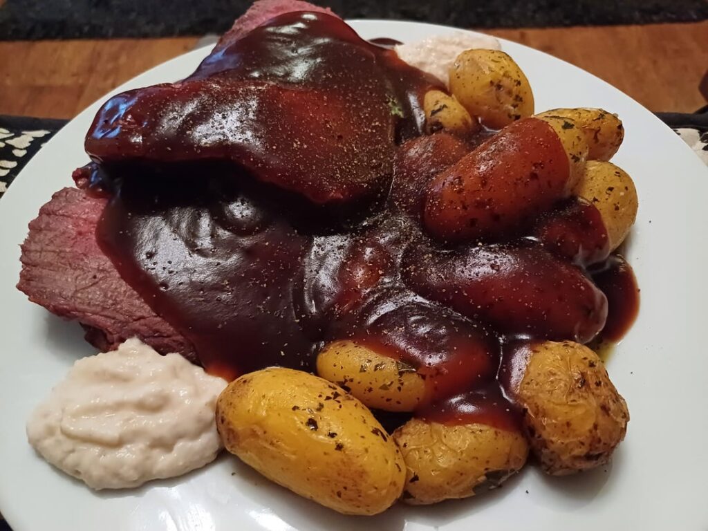 Dry brine beef joint. Simply served with new potatoes horseradish sauce and beef gravy.