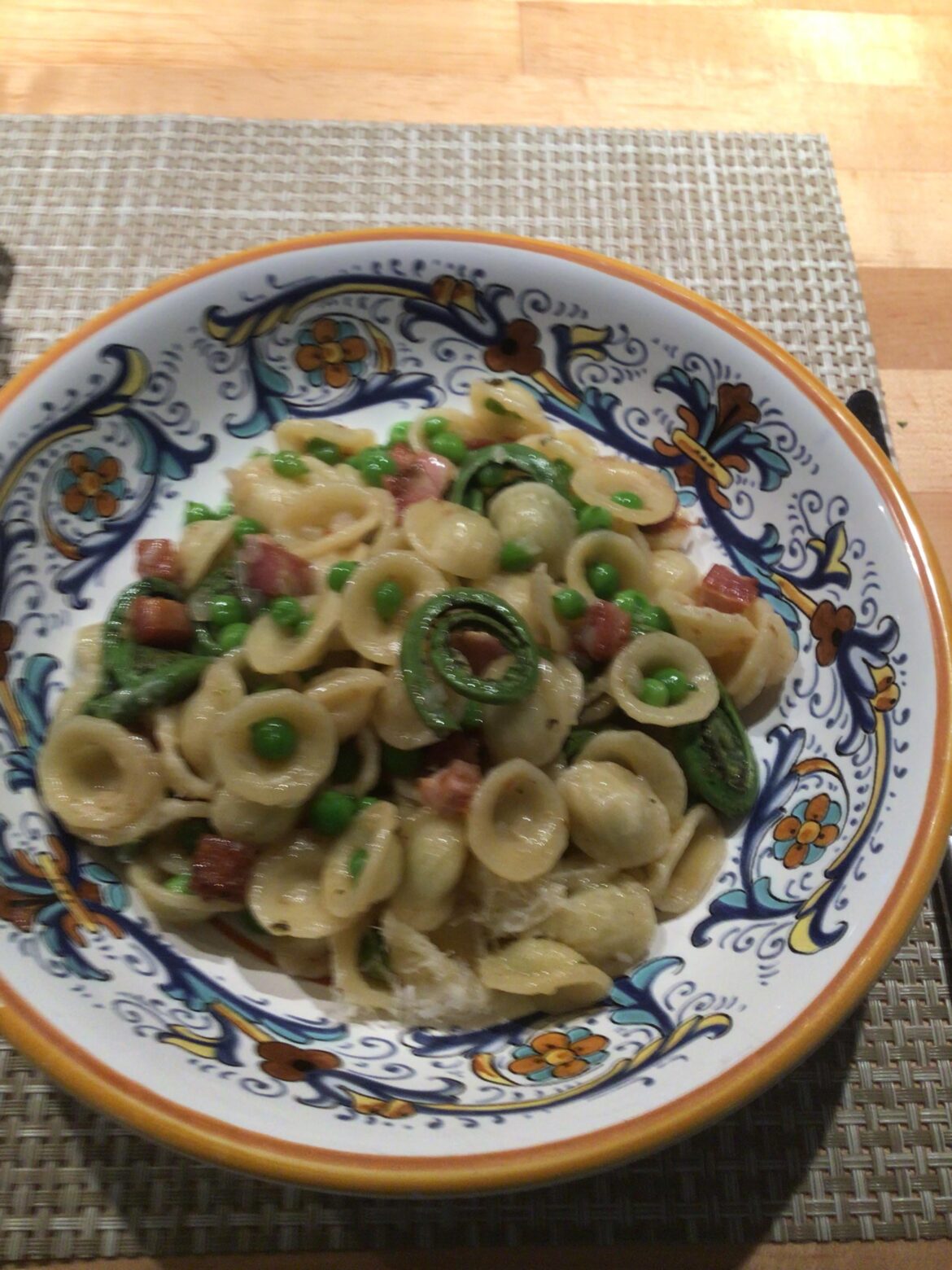 Orecchiette with pancetta, garden peas, and fiddlehead ferns