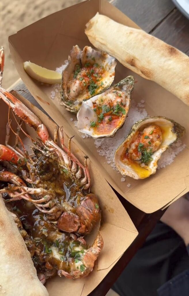 Fresh lobster and oysters by the coast.