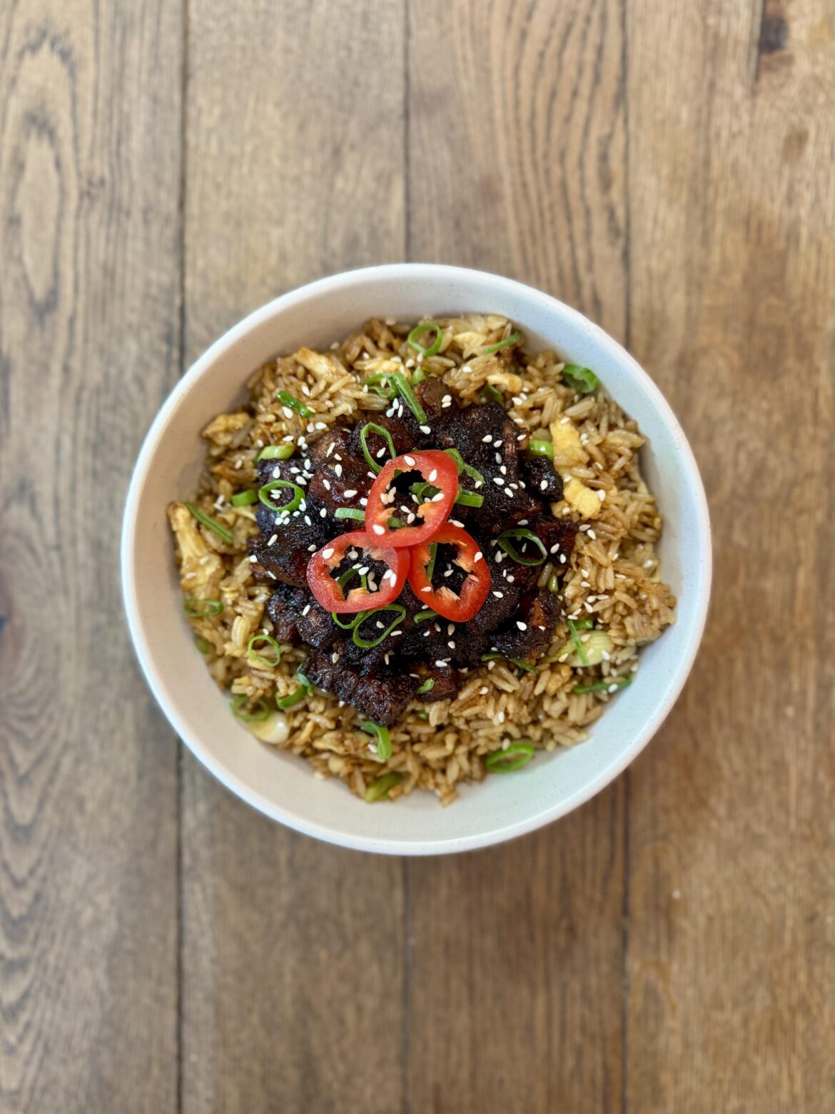 Sticky honey-ginger pork belly with egg fried rice