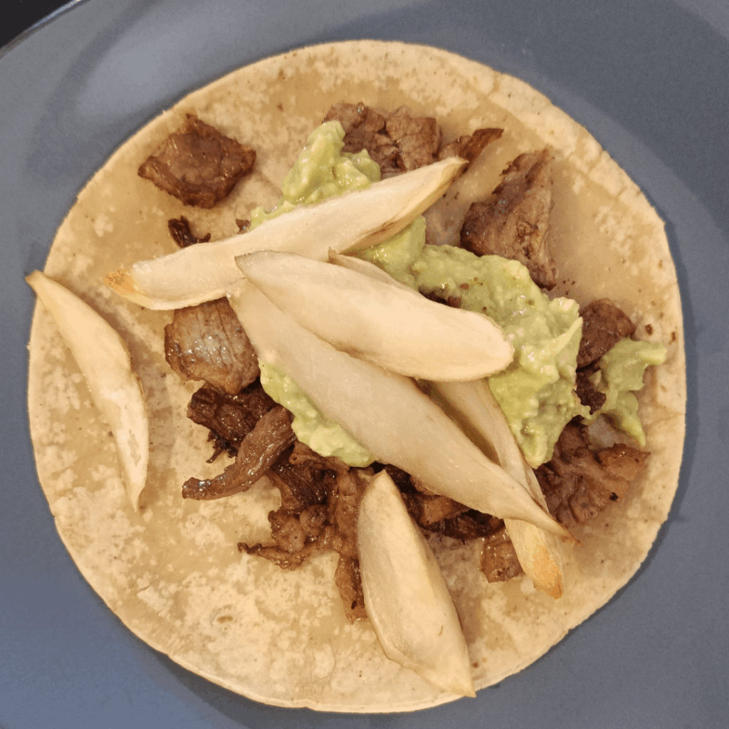 French fries on a carne asada taco, roast me