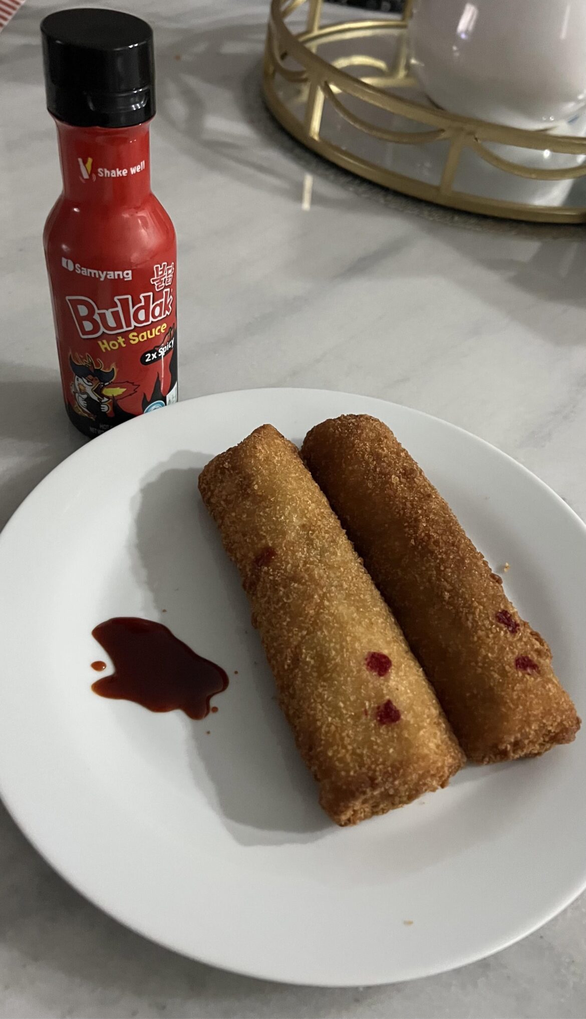 2 lamb rolls with the hot sauce