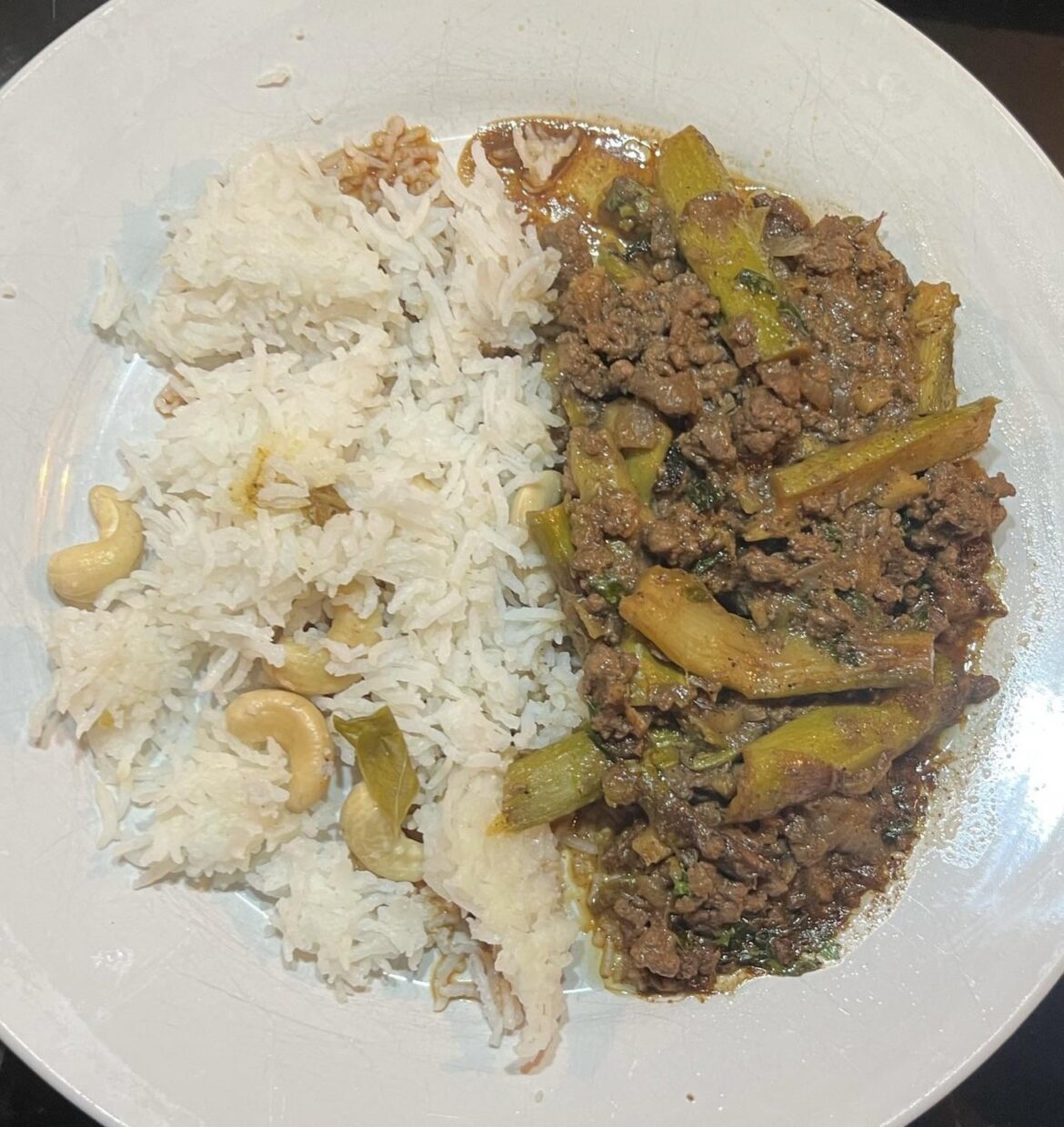 Asparagus beef mince with cashew curry leaf rice