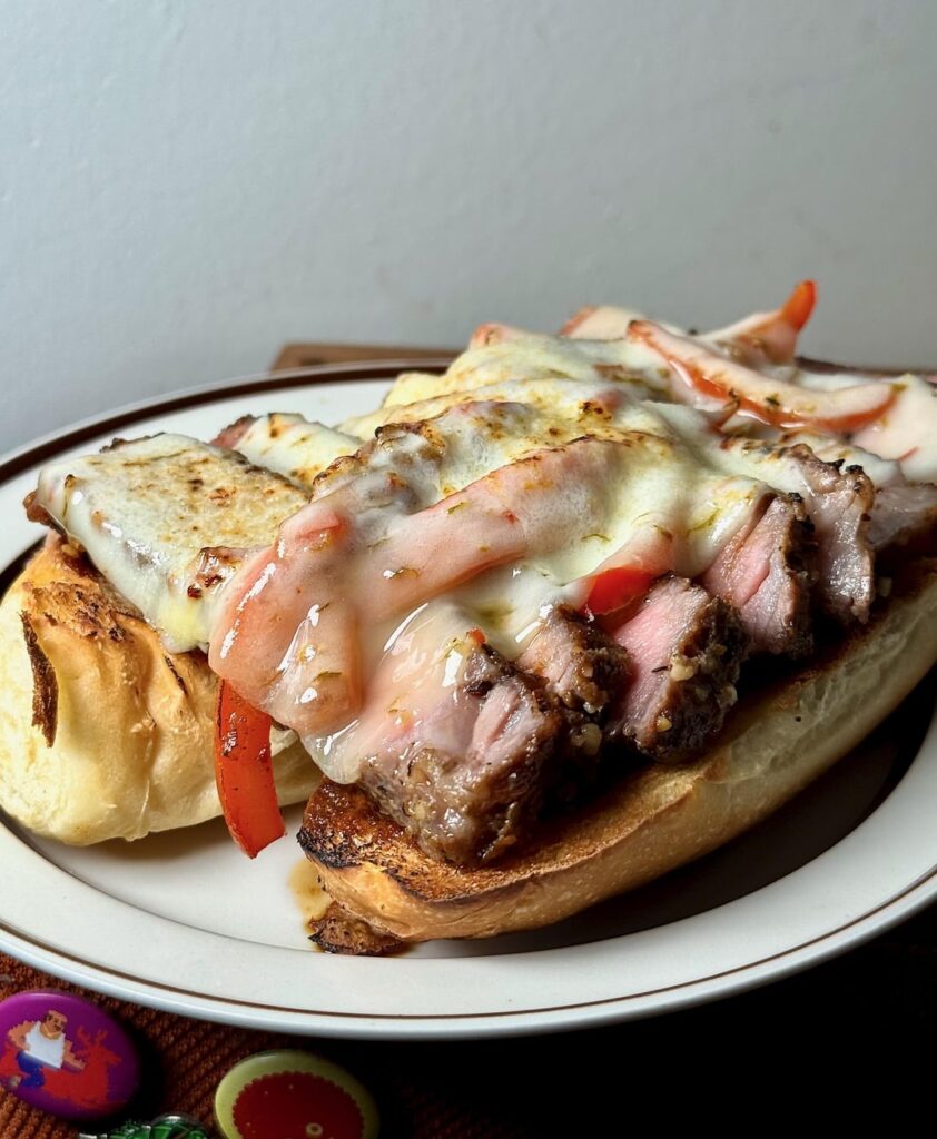 First steak sandwich in a long time - Sous vide ribeye with shallots, peppers, and pepper Jack.