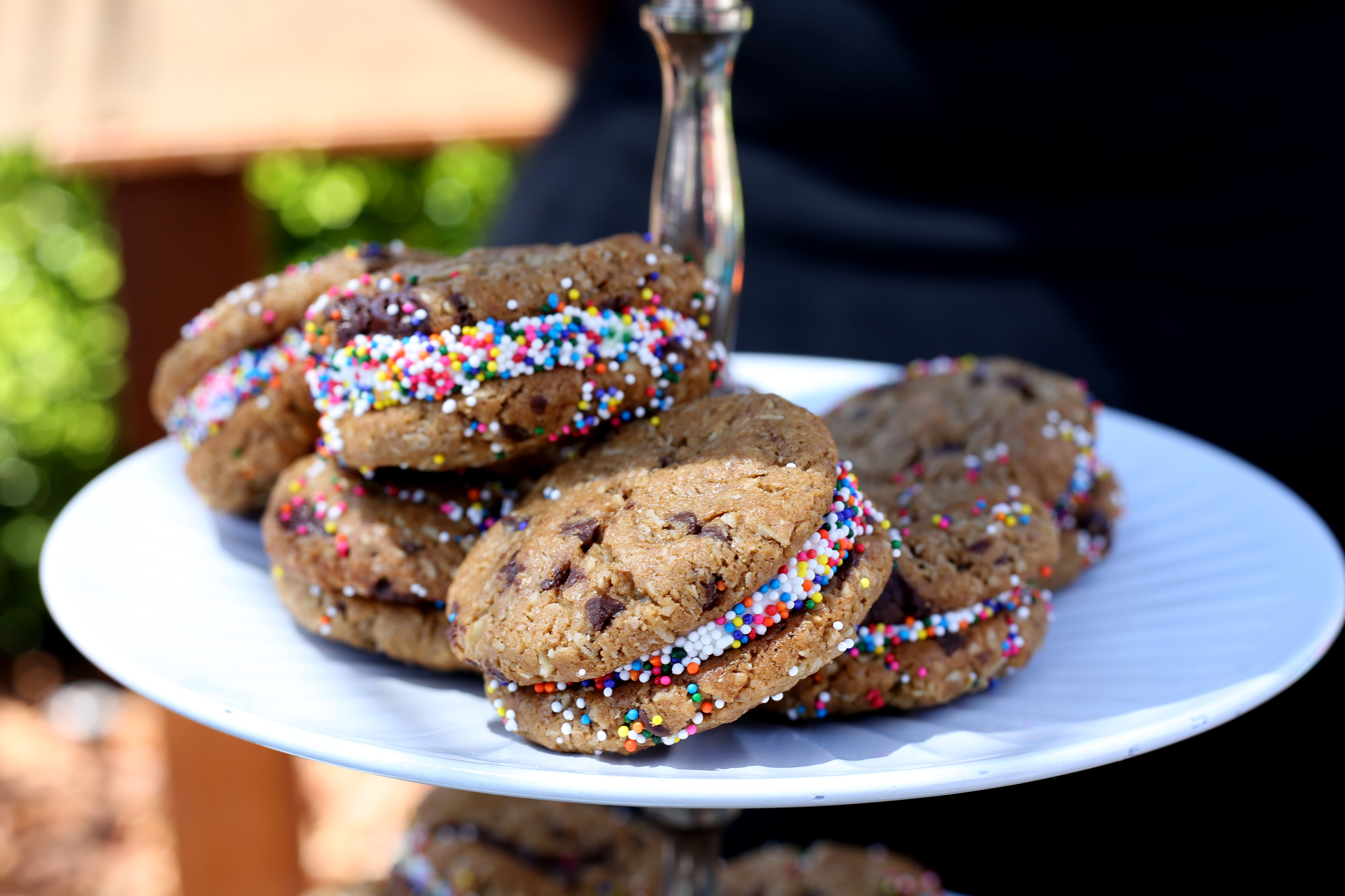 Sweet Cheeks Baking Co. and Diner's Whookie. This tasty treat is a whoppie pie meets a cookie - plus, it's gluten-free! Oatmeal peanut butter chocolate chunk cookies with Italian buttercream in the middle, rolled with sprinkles.