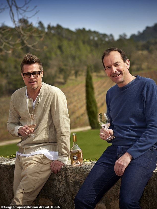 The ongoing legal battle saw Brad Pitt demand his ex-wife hand over documents for previous agreements she's entered with third parties after she claimed she backed out of the deal over his 'cruel' NDA clause. He is pictured at the chateau with business partner Marc Perrin
