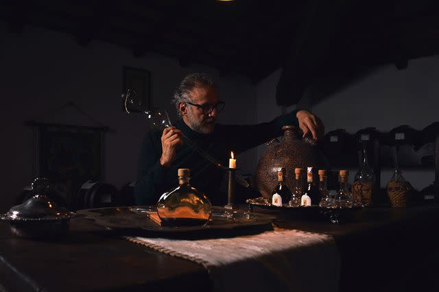 Sueo Massimo producing modenese balsamic vinegar in the Acetaia (where traditional balsamic vinegar is produced and aged) in Casa Maria Luigia.