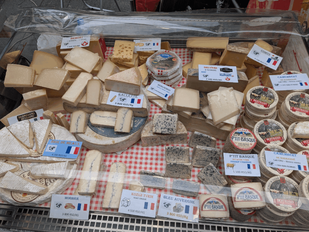 French cheeses stall in a street market in Belgrade, Serbia