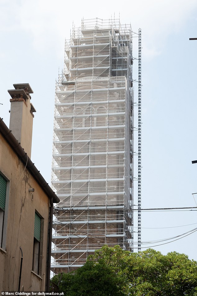 The  bell tower of the 15th Century Madonna dell Orto church in Venice's quaint Cannargio district is currently covered in scaffolding