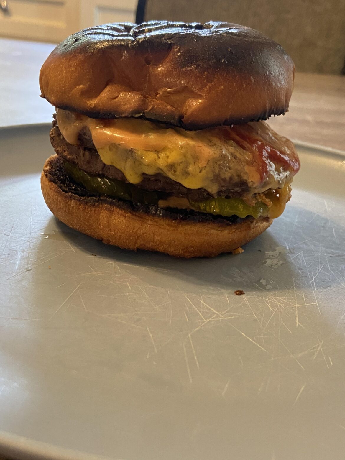 Toaster was set too high.     Cheddar cheese and pickles and sauce.