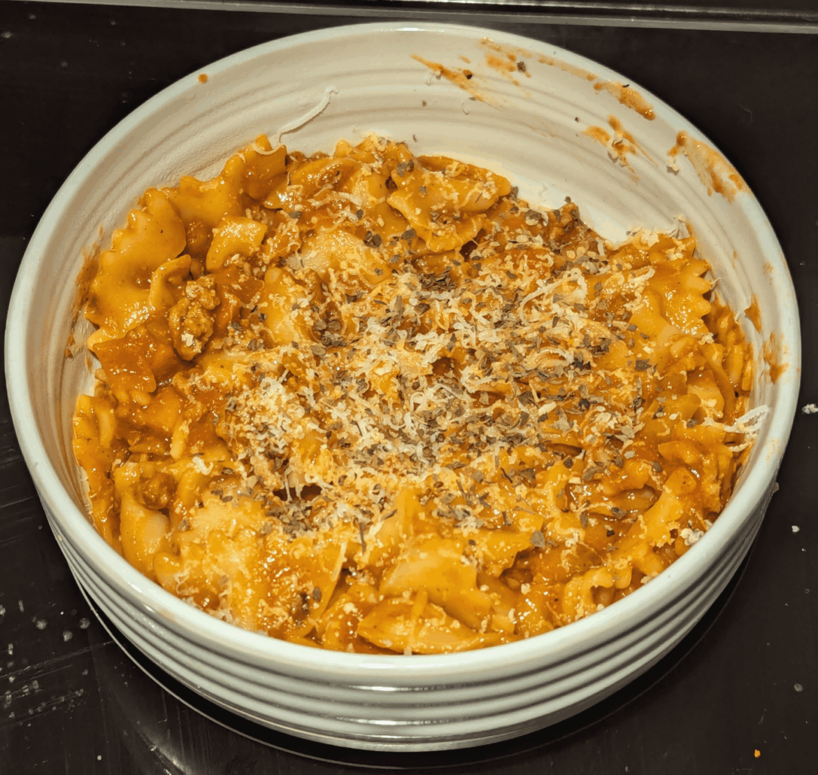 Farfalle in a nice Red meat sauce topped with pecorino