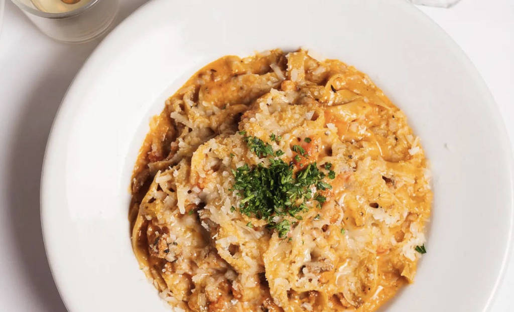 pasta dish on a white plate from A tavola in chicago