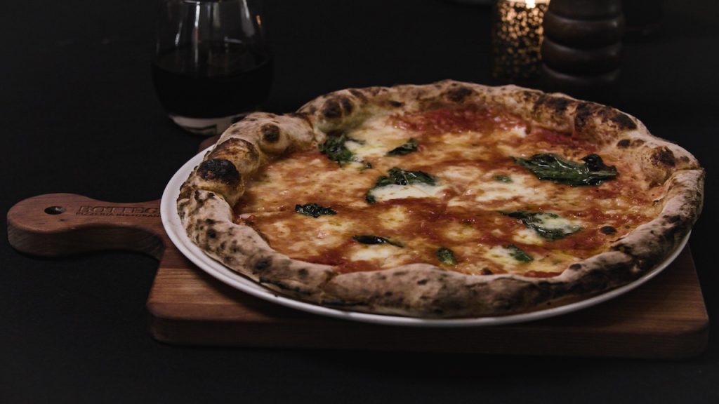 A pizza sits on a table