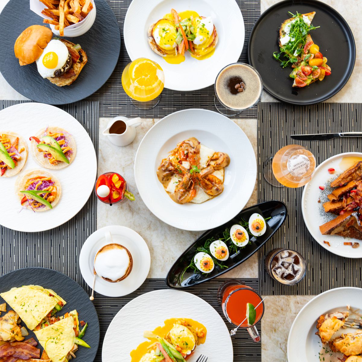 Artisans’s brunch spread of deviled eggs, shrimp and grits, French toast, and more.