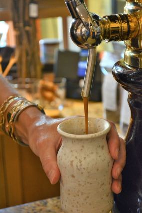 DSC_5715 The Happy Olive in Fairhope has developed a loyal following for its house-blends of olive oils, balsamic vinegars and mustards, which can be purchased by the bottle and jar or on tap. (Karim Shamsi-Basha / Alabama NewsCenter)