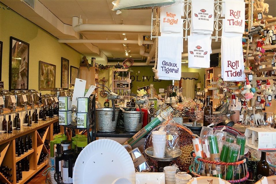 DSC_5725 The Happy Olive in Fairhope has developed a loyal following for its house-blends of olive oils, balsamic vinegars and mustards, which can be purchased by the bottle and jar or on tap. (Karim Shamsi-Basha / Alabama NewsCenter)