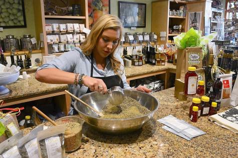 DSC_5733 The Happy Olive in Fairhope has developed a loyal following for its house-blends of olive oils, balsamic vinegars and mustards, which can be purchased by the bottle and jar or on tap. (Karim Shamsi-Basha / Alabama NewsCenter)